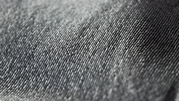 Highly detailed grey cloth fabric fluttering on the wind. Loopable animation 4K