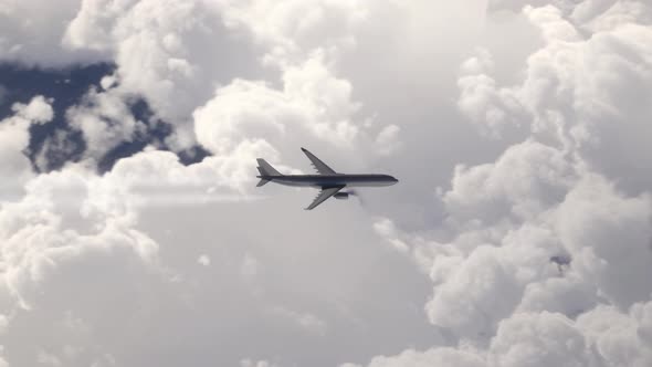 Airplane Flying Above the Clouds 4k