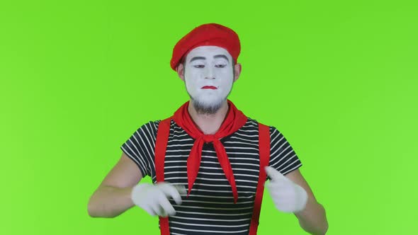 Male Mime Is Eating On A Green Background