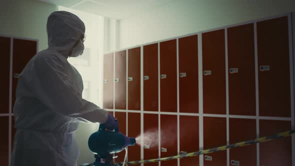 Video of worker disinfection school during a pandemic. Shot with RED helium camera in 8K. alt