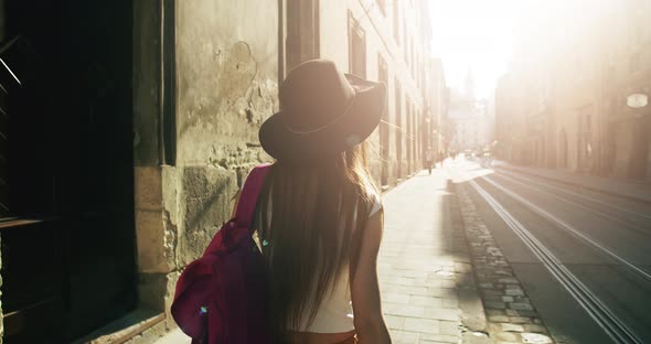 Female Tourist with Backpack Travelling