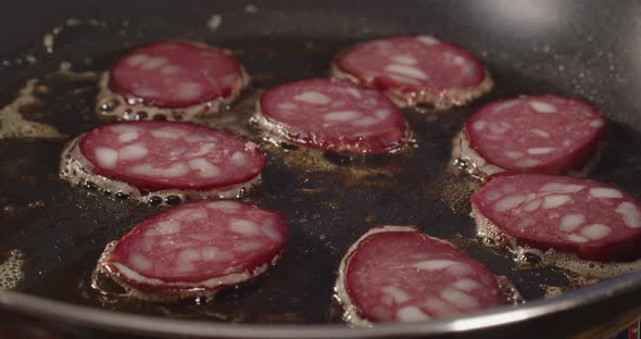 On A Frying Pan Frying Bacon With Egg. Cooking