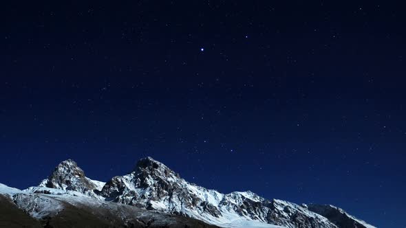 Snowy Mountain Stars Time Lapse alt