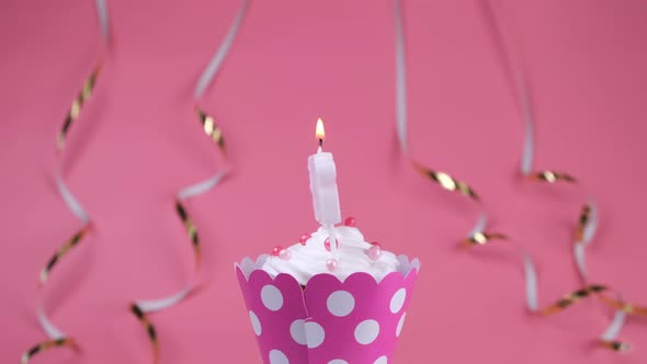 Rotating Birthday Cake for Girls or Women or a Cupcake with a Burning Candle with the Inscription