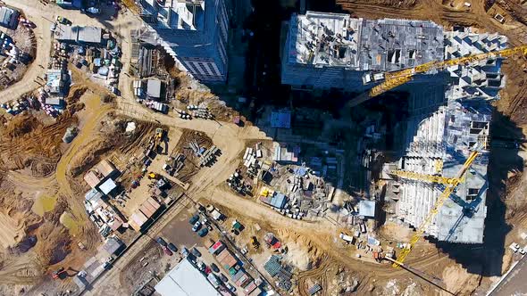 Drone Flies Over a Construction Site Near Moscow. Construction Cranes in the Industrial Zone