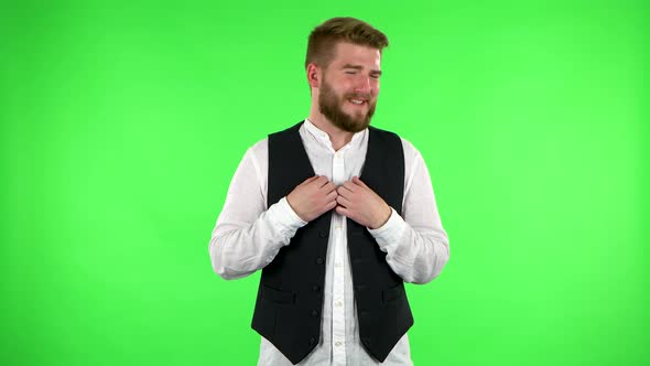 Man with Smile Expressing He Is Innocent, Saying He Doesn't Know What's Going. Green Screen alt