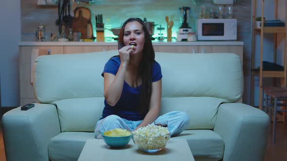 Woman Spending Free Time Watching TV alt