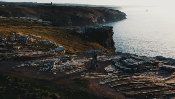 Aerial view around the Monument to King Arthur in Britain Monument close up on sea background