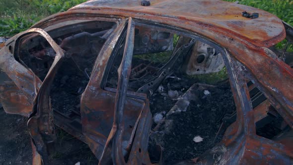 Burned Car. Deformed Fire Machine. Consequences of Car Accident. Damaged By Arson