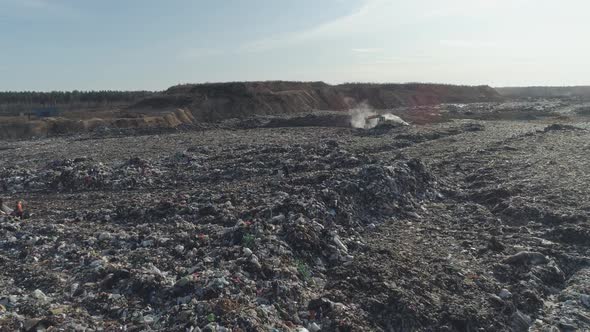 Garbage Dump Aerial View of the Waste Storage Escalator Digs a Trench Methane Extraction View From a alt
