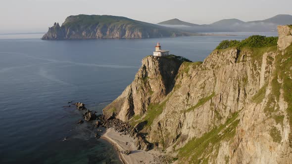 Lighthouse Baluzek on the Coast of the Sea of Japan alt