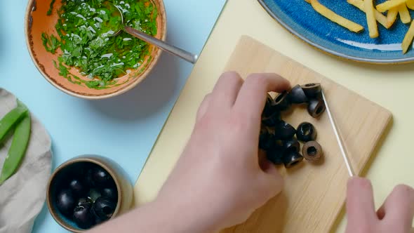 Vertical Flat Lay Video Chef Cuts the Olives Tabletop Recipes