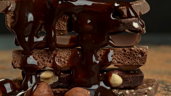 Stack of Various Chocolate Pieces and Nuts, High Quality UHD Shot alt