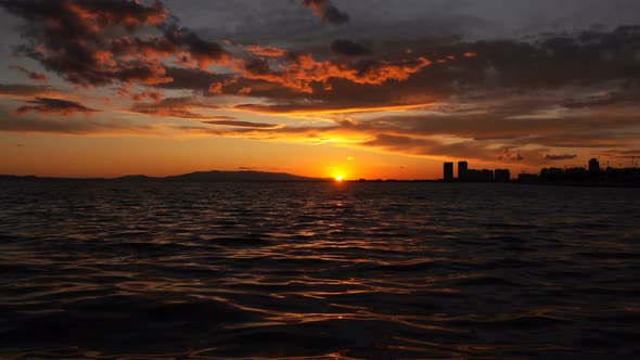 Sunset Lights And The Sea