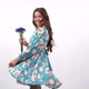 Happy Child Turning Showing Her Floral Dress with Centaurea Wildflower Flower Bouquet Summer Look - VideoHive Item for Sale