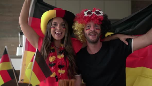 Crazy German soccer Fan Couple With Flag of Germany