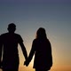 Сouple walks holding hand in hand - VideoHive Item for Sale