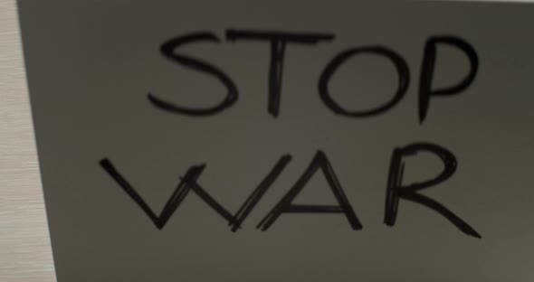 Paper Falls with the Message No War alt