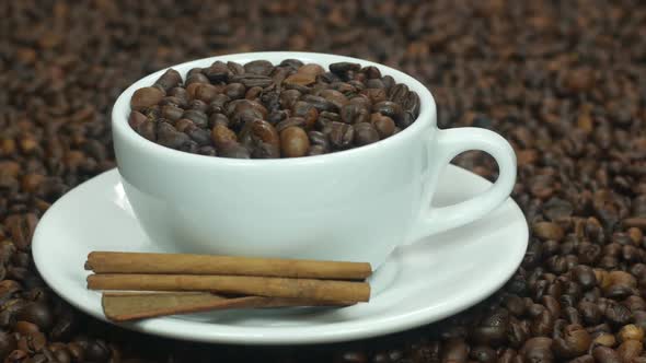 Coffee Beans And Cinnamon In A Cup