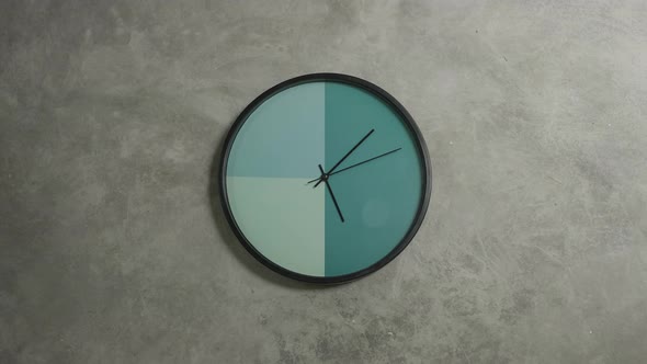 Clock Going Around on Grey Background alt
