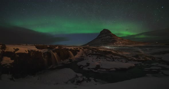  Timelapse of Aurora Borealis Northern Lights Over Kirkjufell Mountain. Iceland in the Early Spring
