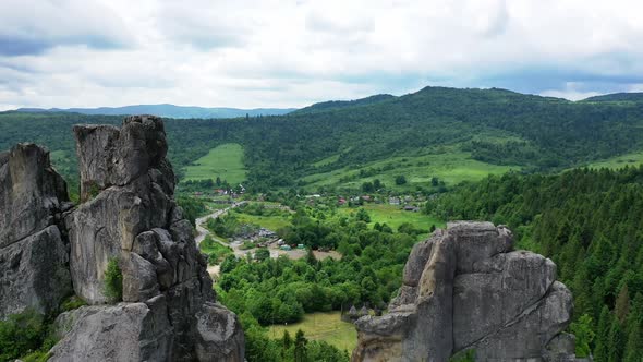 Aerial Drone View of Famous Ukrainian Medieval Cliffside Tustan Fortress Ruins alt