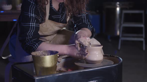 Pottery Crafting in the Art Studio  Woman Forming a Simple Pot Out of Clay alt