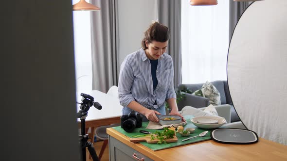 Food Photographer with Camera Working in Kitchen alt