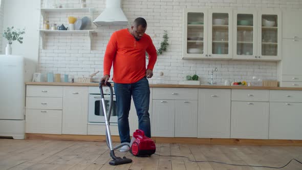 Black Male Distracting By Phone Call During Cleanup alt