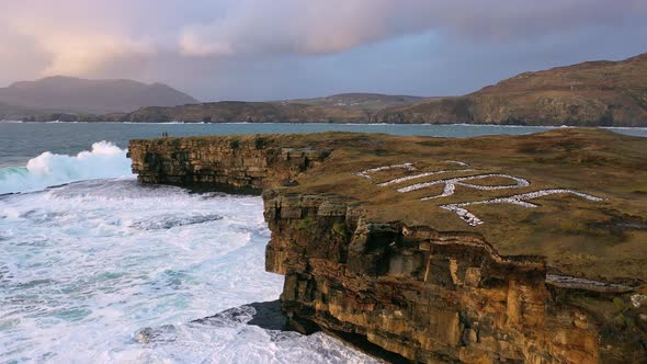 Huge Waves Breaking at Muckross Head - A Small Peninsula West of Killybegs, County Donegal, Ireland alt
