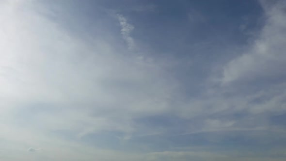 Time lapse of white cloud moving pass around sky background alt