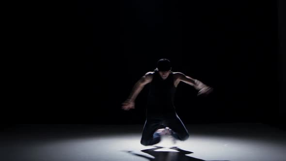 Breakdance Dancer In Black Suit Starts Dance On Black Shadow Stock Footage