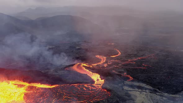 Aerial View Of The Boiling Lava Lake Flowing Down The Fissures Of The Volcano. alt