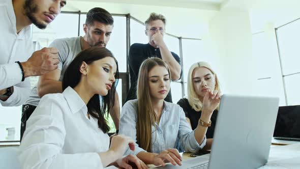 Young Employees During the Work Process. Question and Not Perception on the Faces The Decision Came alt
