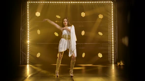 Attractive Girl Dance in Greek Greece Goddes Dress and Wreath High Fashion. Young Hot Brunette with alt