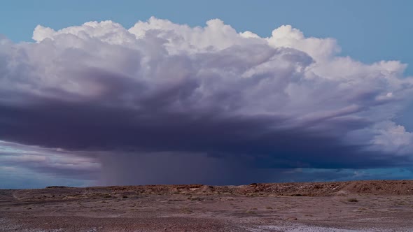 Timelapse of storm cell growing in the Utah desert as lightning flashes alt