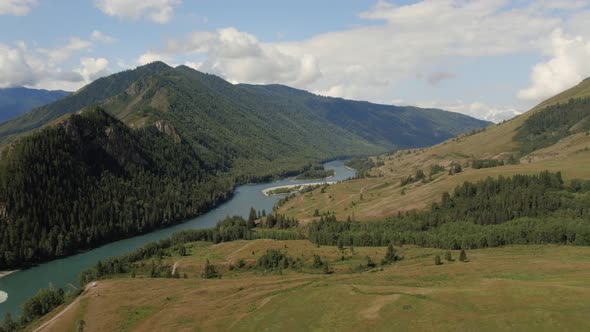 Blue Katun river in the middle of mountains of Ak-Kem valley in Altai