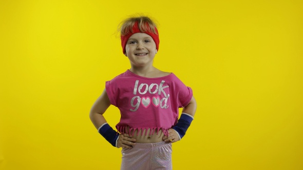 Young Girl in Sportswear Making Fitness Gymnast Home Exercises, Workout for Kids, Sporty Child alt