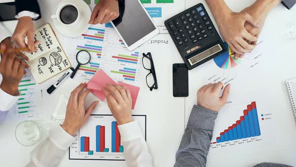 Top View of Colleagues Brainstorming alt