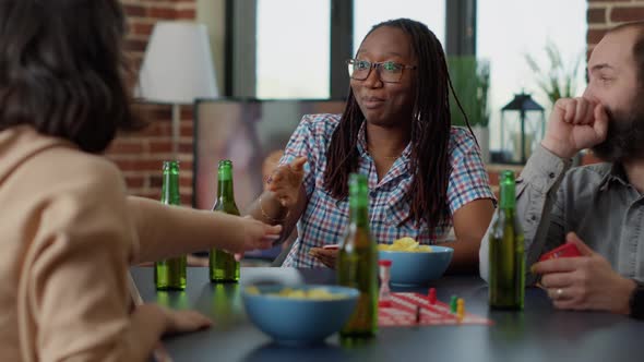 Men and Women Playing Board Games Competition for Fun alt