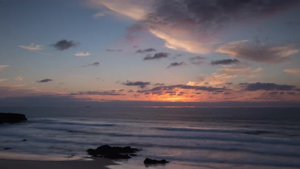Loopable Video of Clouds Moving in Sky at Sunset Over Atlantic alt