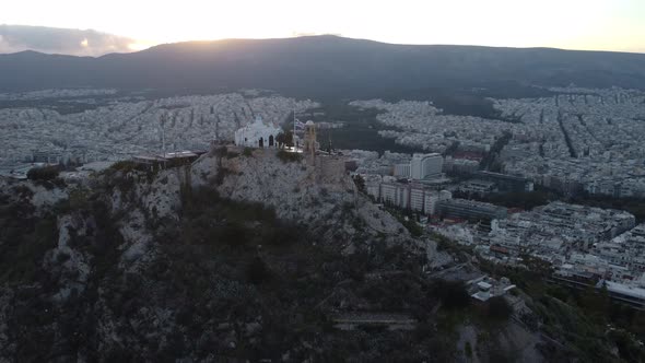 Drone View of Mount Lycabettus From Church of Saint George During Sunrise