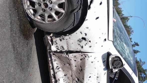 Vertical Video of Destroyed and Shot Cars in the City of Irpin Ukraine alt
