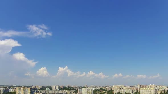 Clouds in the Blue Sky over City