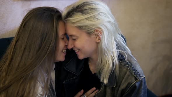 Two Stylish Cool Diverse Pretty Affectionate Women Hugging Bonding alt