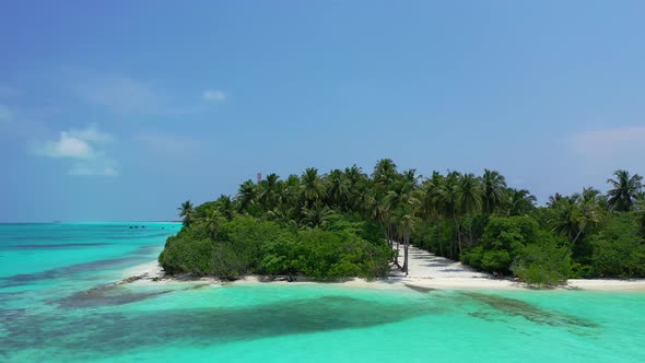 Wide fly over abstract view of a summer white paradise sand beach and turquoise sea background in vi alt