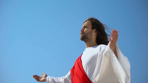 Saint Man Looking at Sky With Opened Hands, Jesus Resurrection and Ascension alt