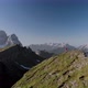 Aerial Spin Around Man Hiker In Front of Pelmo and Civetta Mountain in Dolomites Italy - VideoHive Item for Sale