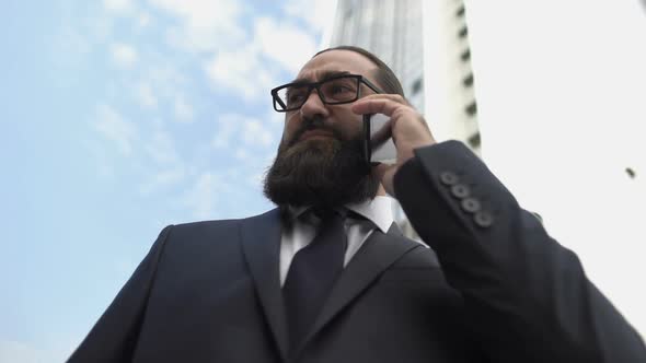 Angry Boss Talking on Phone, Unpleasant Business Conversation With Employee