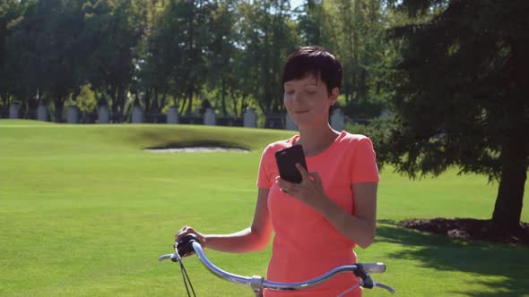 Women Using Smartphone Outdoor.  Video Prores alt